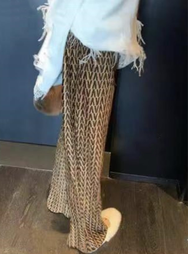 幾何学柄プリーツワイドパンツ
