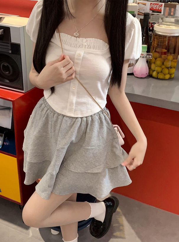 パフスリーブレイヤード風フリルリボントップス