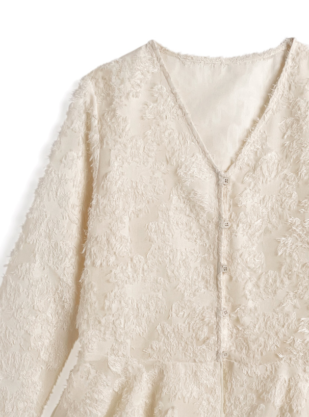 フラワーシアーペプラムトップス