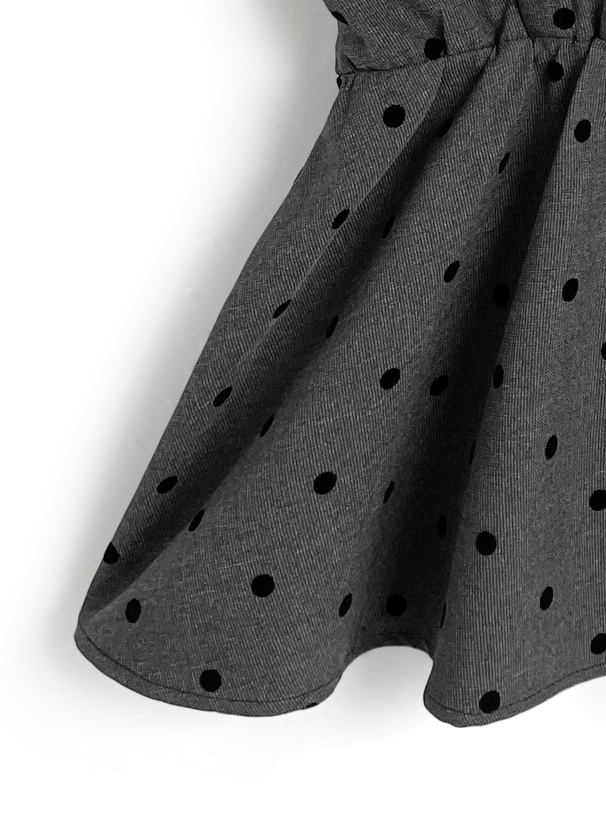 ドット柄ドッキングペプラムトップス