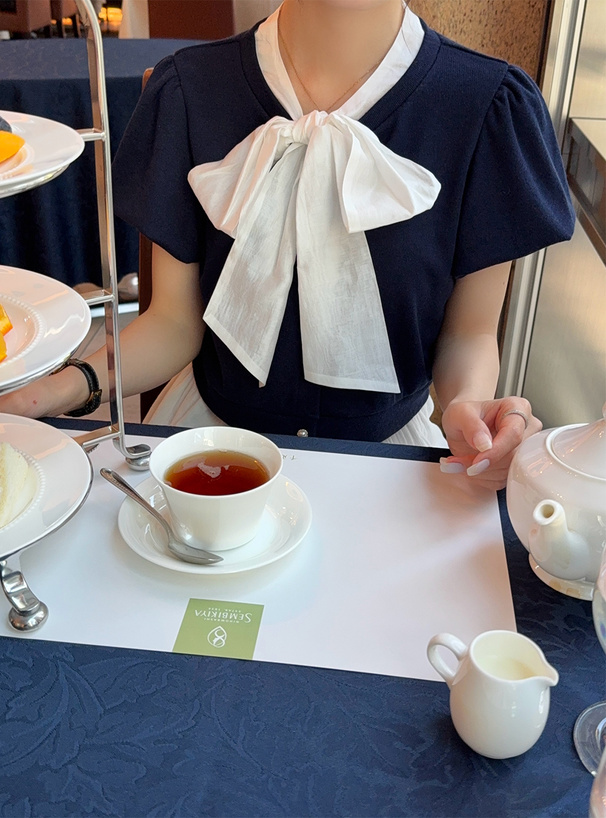 ボウタイレイヤード風バルーンスリーブカーディガン