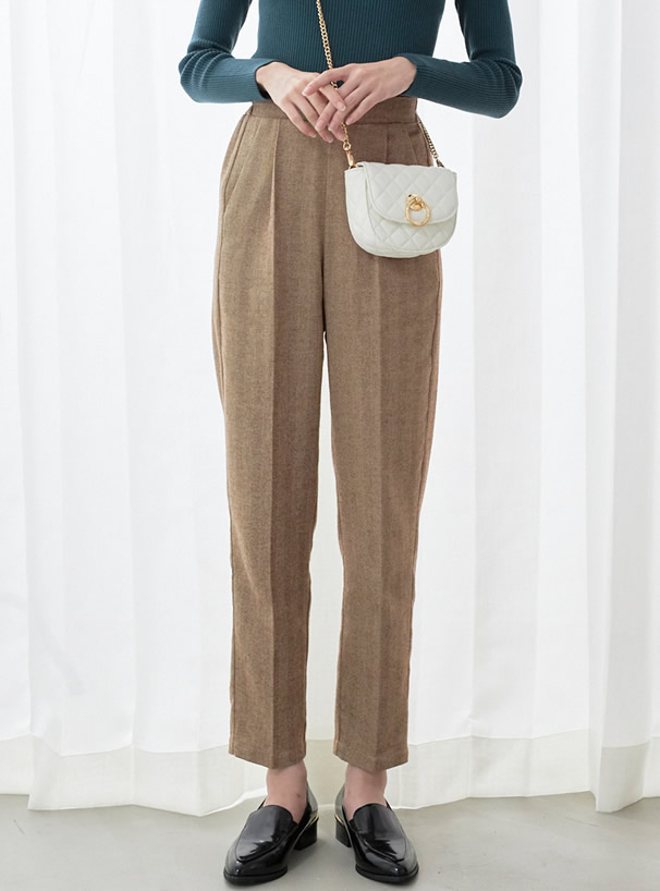 ヘリンボーンセンタープレステーパードパンツ