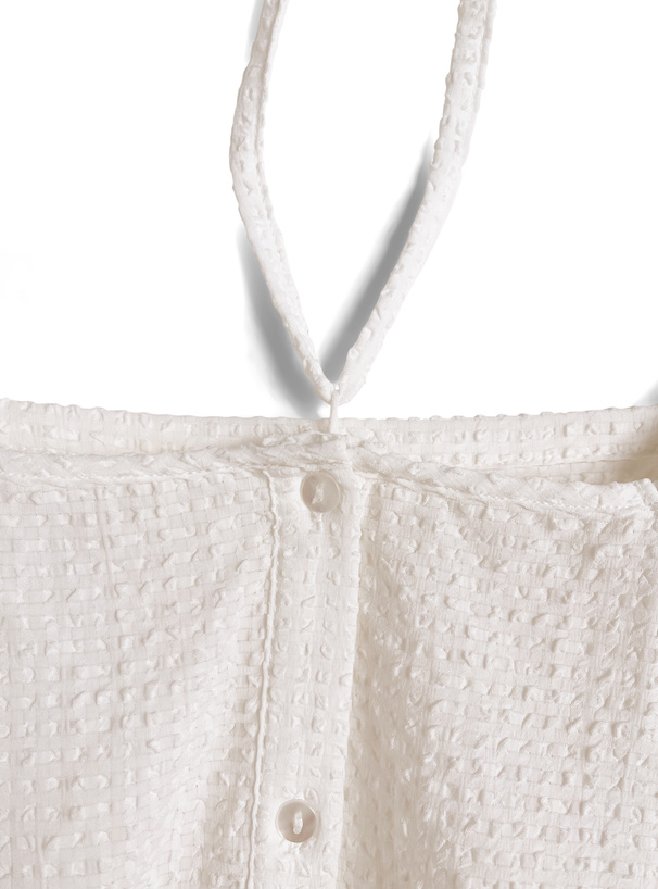 ホルターネック付きバルーンスリーブペプラムブラウス