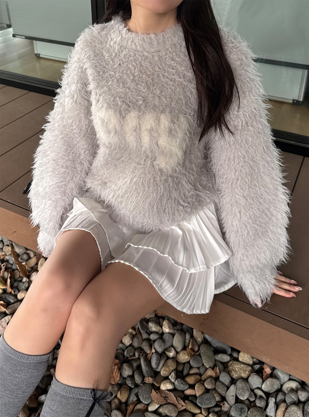 ロゴブークレニットトップス