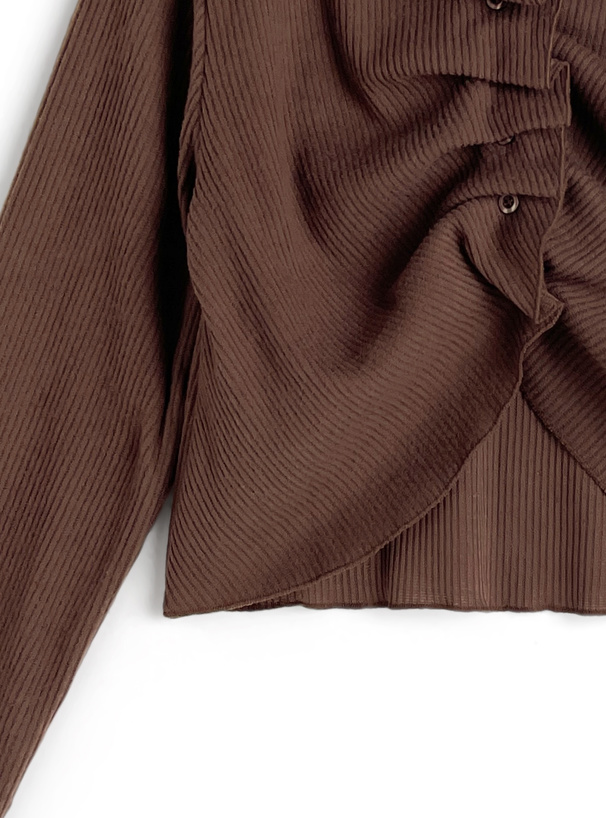 タックボタンリブトップス