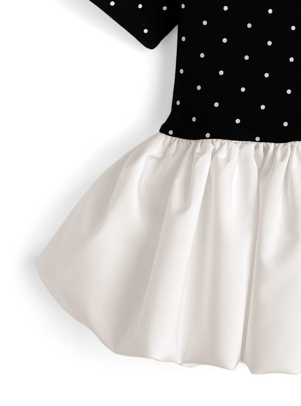 ドット柄バックリボンバルーンペプラムトップス