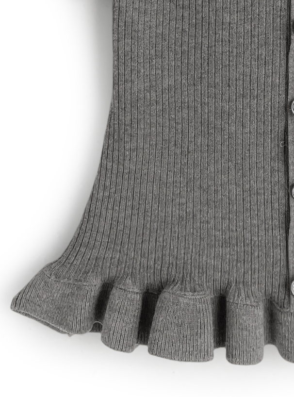 ドット柄フリルリボンレイヤード風ペプラムニットトップス