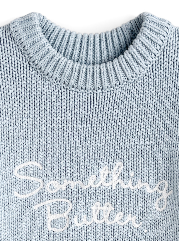 ロゴ刺繍ニットトップス