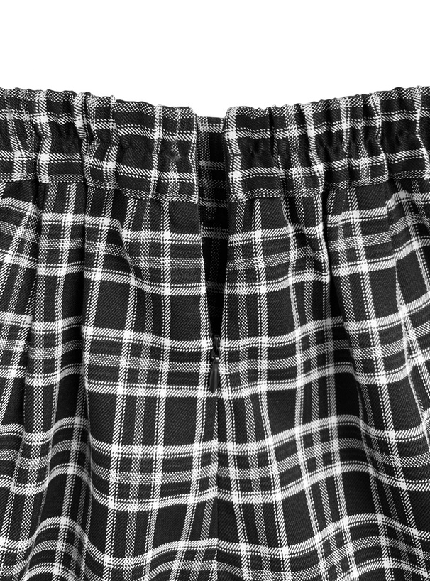 チェック柄レイヤード風ペプラムトップス×ショートパンツセットアップ