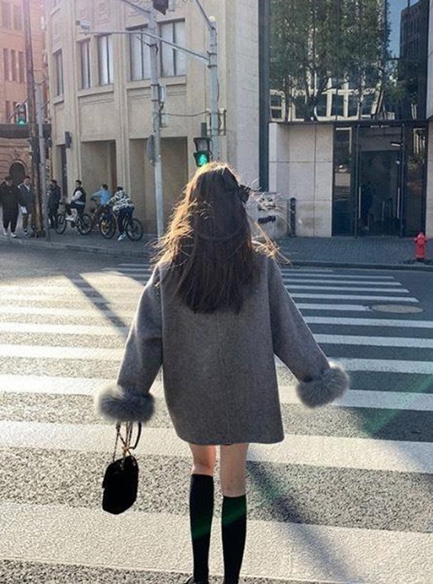 ファーカフス付きネックリボンミドル丈コート