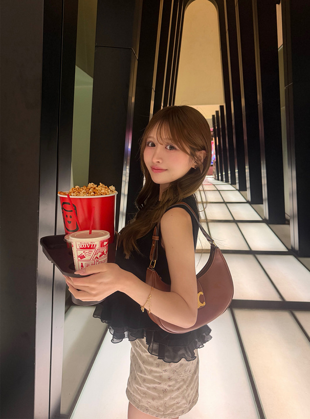 ウェーブフリルドッキングノースリーブニットトップス
