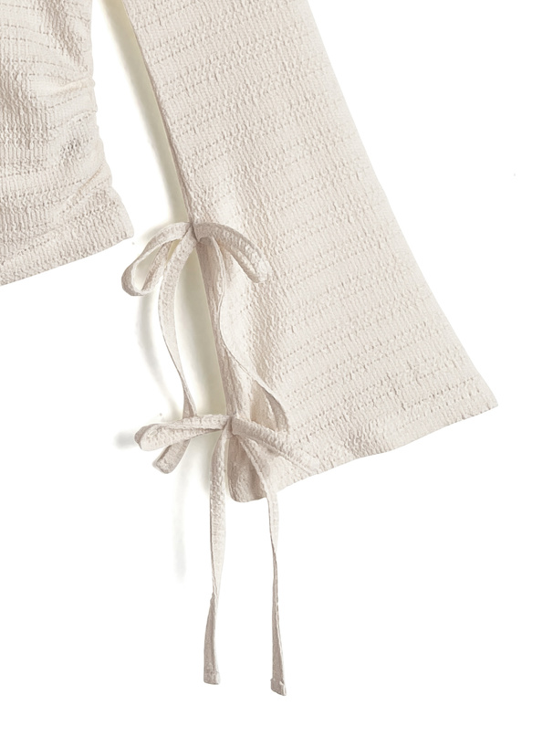 リボンスリーブジャガードハイネックトップス