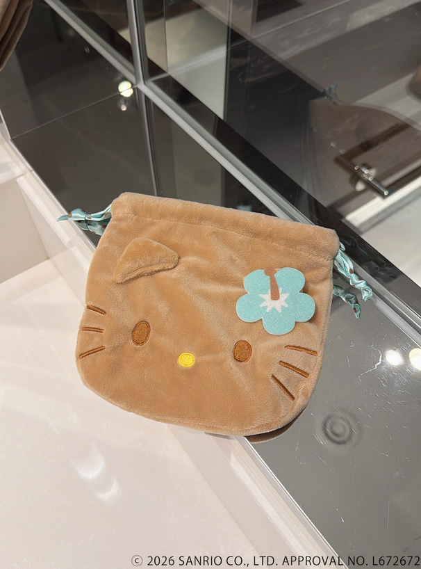 サンリオキャラクターズコラボ　ハートドット柄ハイビスカス付き日焼けハローキティフェイス巾着