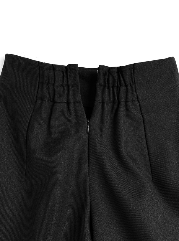 チャーム付きラップ風台形キュロット