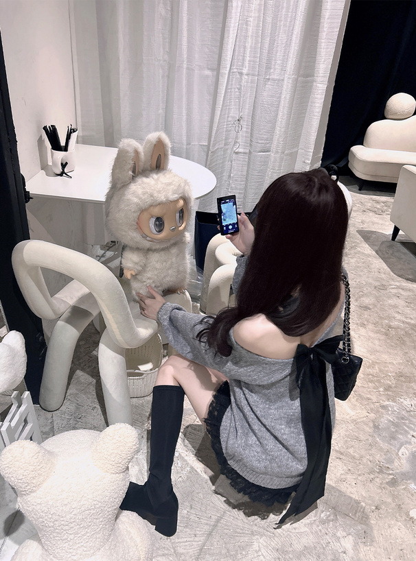 バックオープンリボンニットトップス