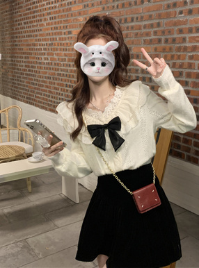 リボン付きレースフリルトップス