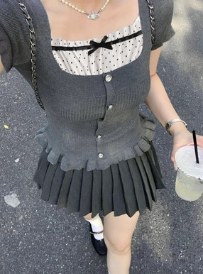 ドット柄フリルリボンレイヤード風ペプラムニットトップス